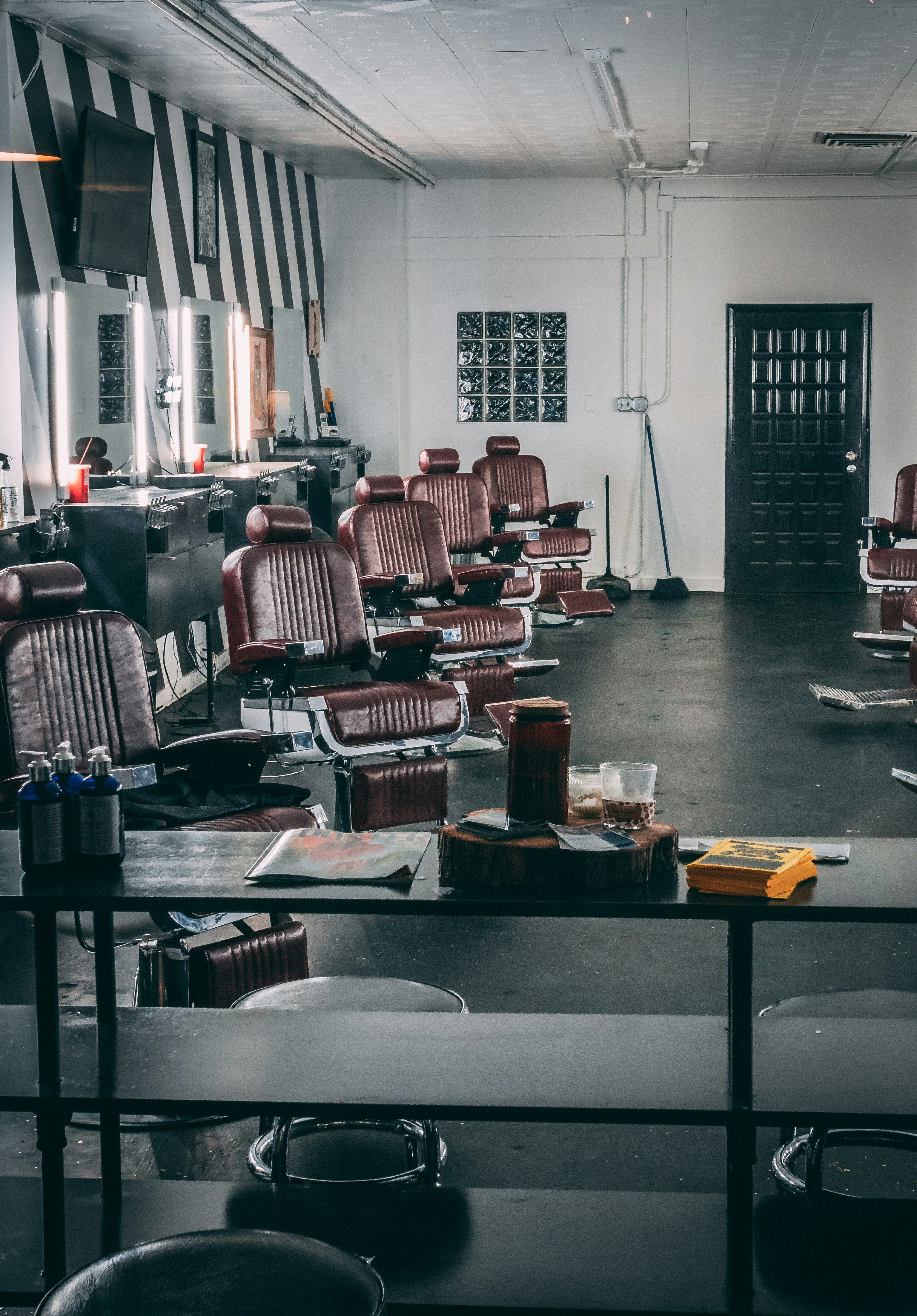 Urban Cutz barbershop interior showing chairs and mirrors